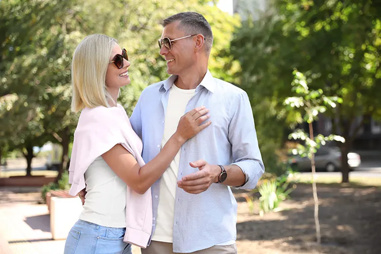 Couple walking in park